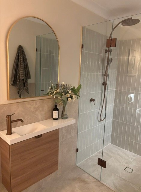 Completed shower and timber vanity